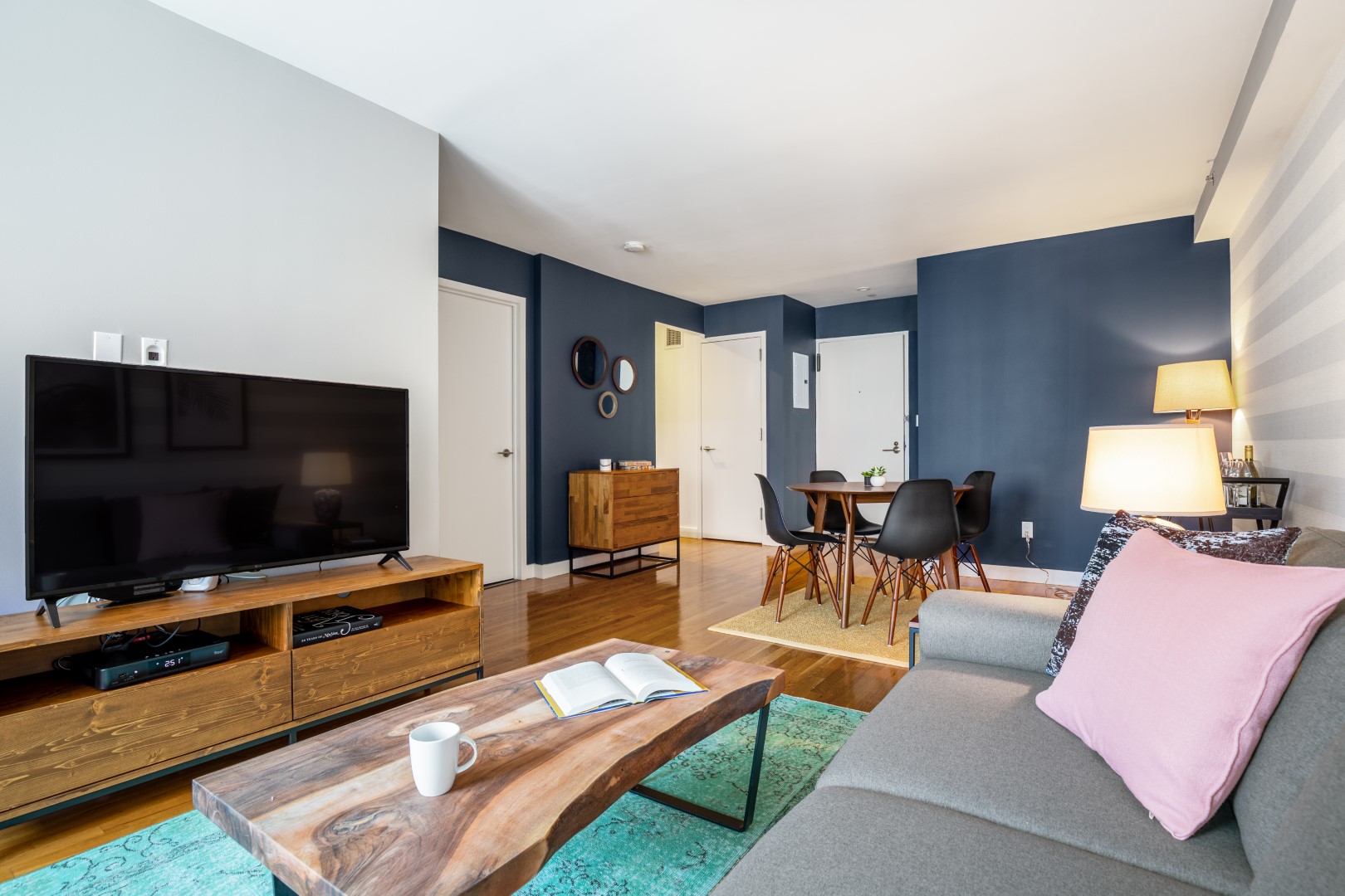 short term rental in chelsea with blue colored walls and modern furniture