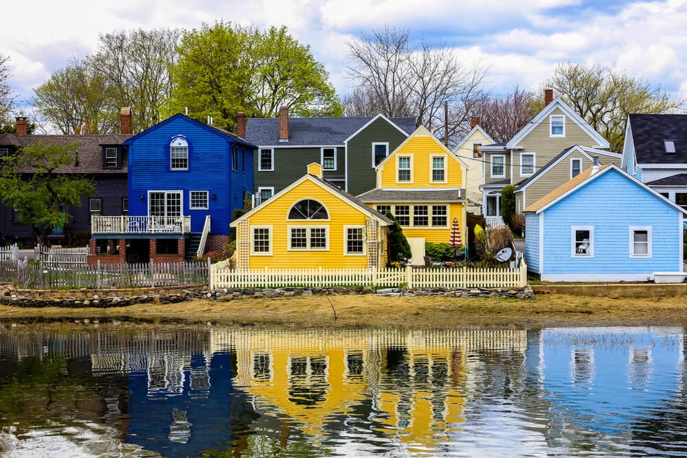 facade of colorful wooden houses in Portsmouth New Hampshire near the water