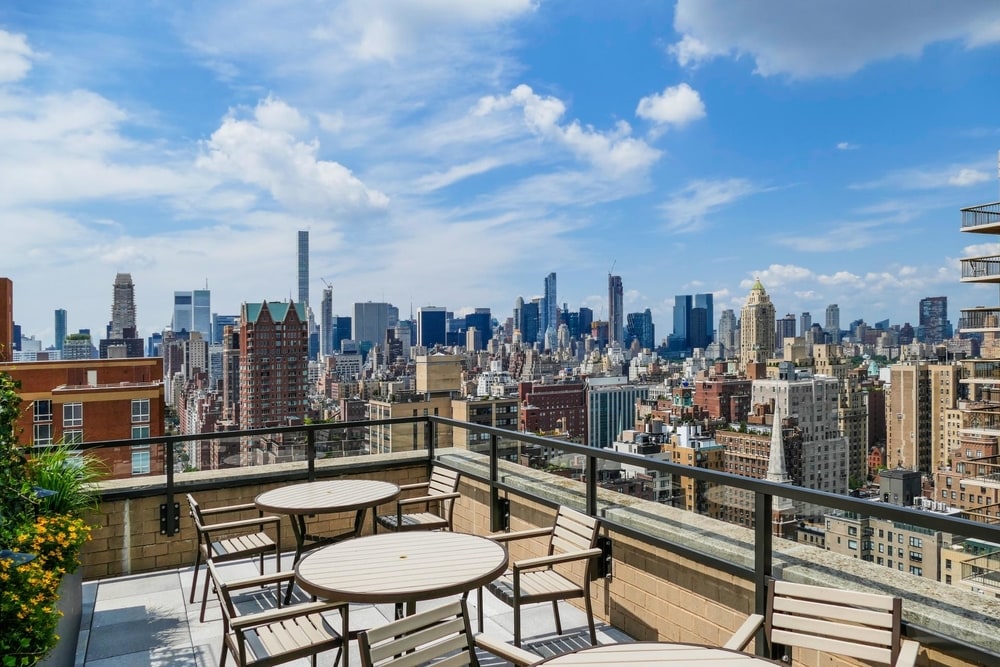 upper east side apartment's furnished roof terrace with skyline view