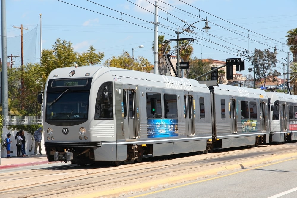A long silver Los Angeles metro rail headed to Pasadena