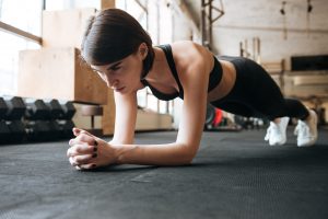 home gym workouts girl in plank position