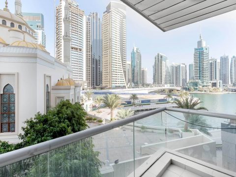 hassle-free living dubai view of Dubai skyline from the balcony of a Blueground apartment