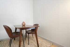 donating furniture corner of room with small wood and brown leather dining set for 2