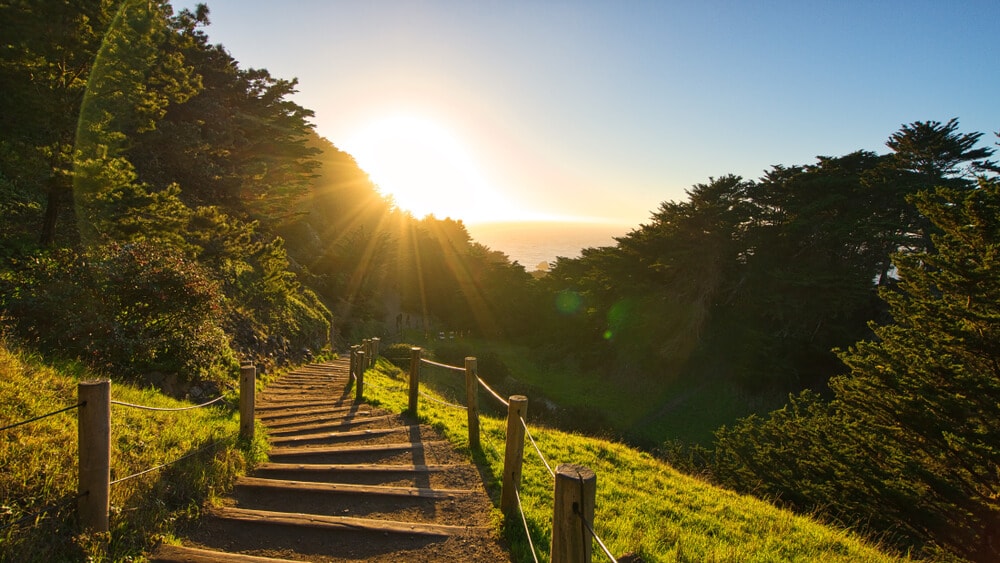 staircase trail with a hand railing during sunset at lands end
