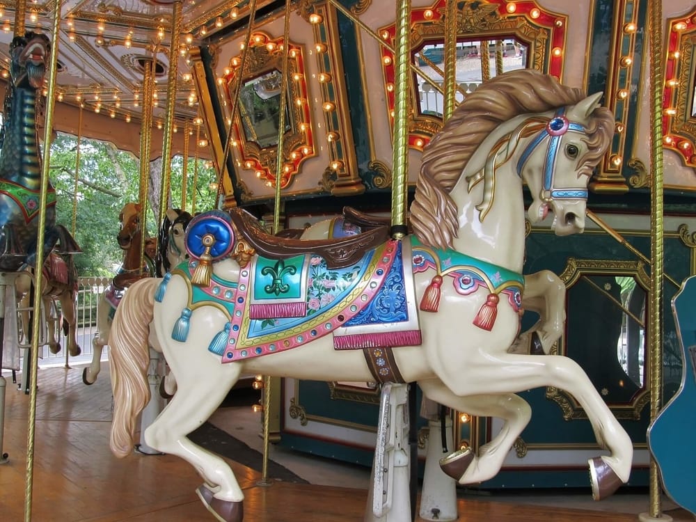 vintage carousel with a wooden horse