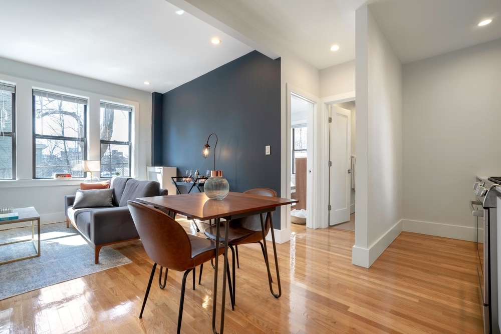 blueprint blueground Harvard apartments apartments near MIT apartments near Boston University clean living space with shiny wooden floors and modern decor