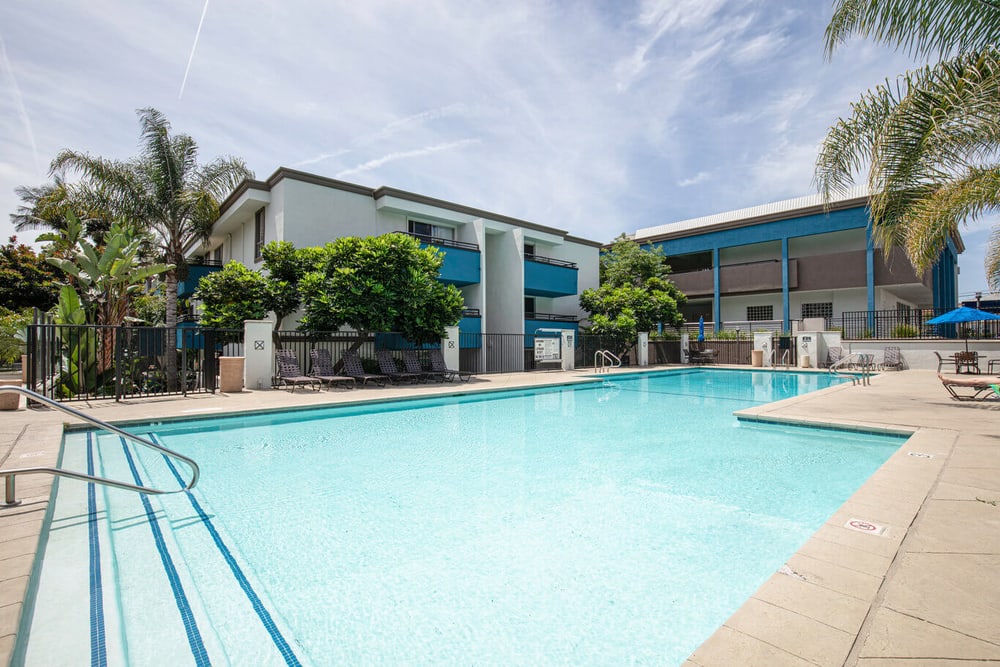 apartment amenities Outdoor residential pool in an apartment block that a Blueground rental is in