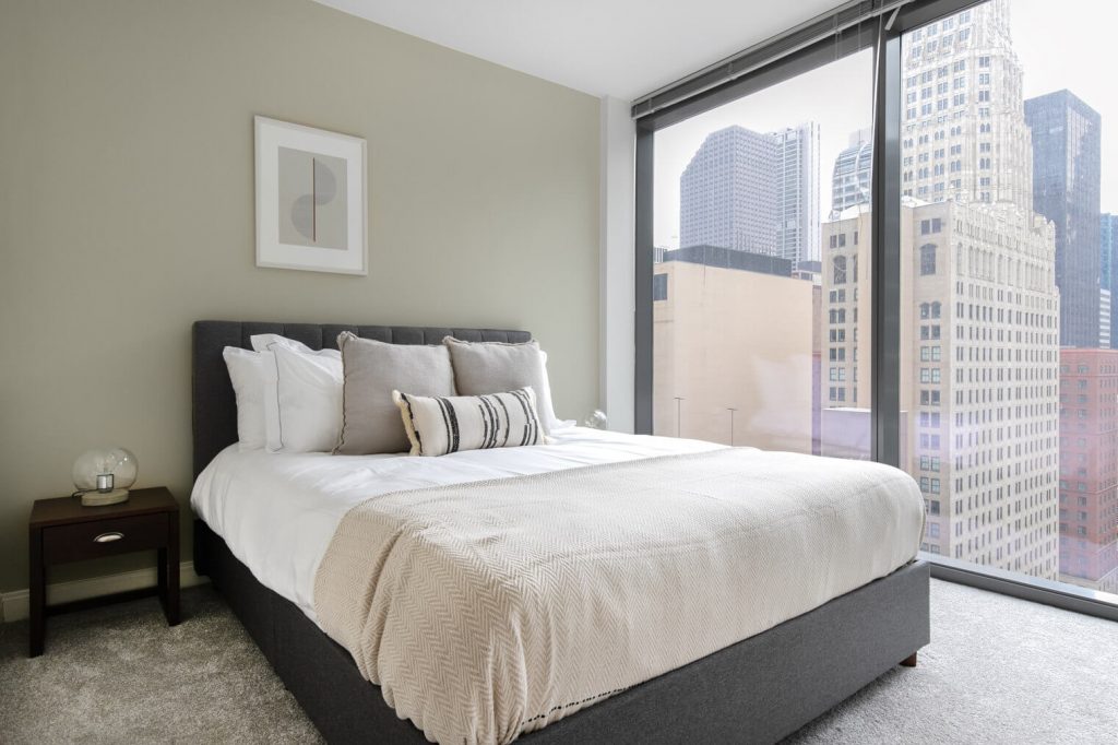 temporary housing for travel nurses in NYC calm bedroom with view