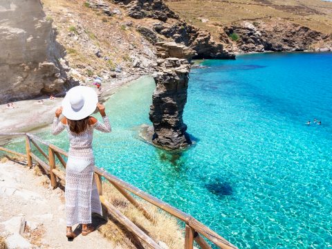 Woman in sun hat in Greece