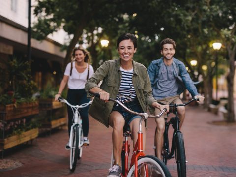 Group riding bicycles
