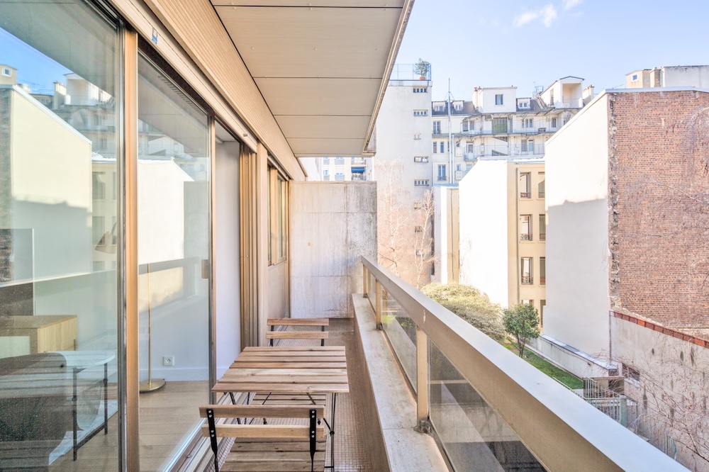 a furnished rental apartment with a balcony in paris