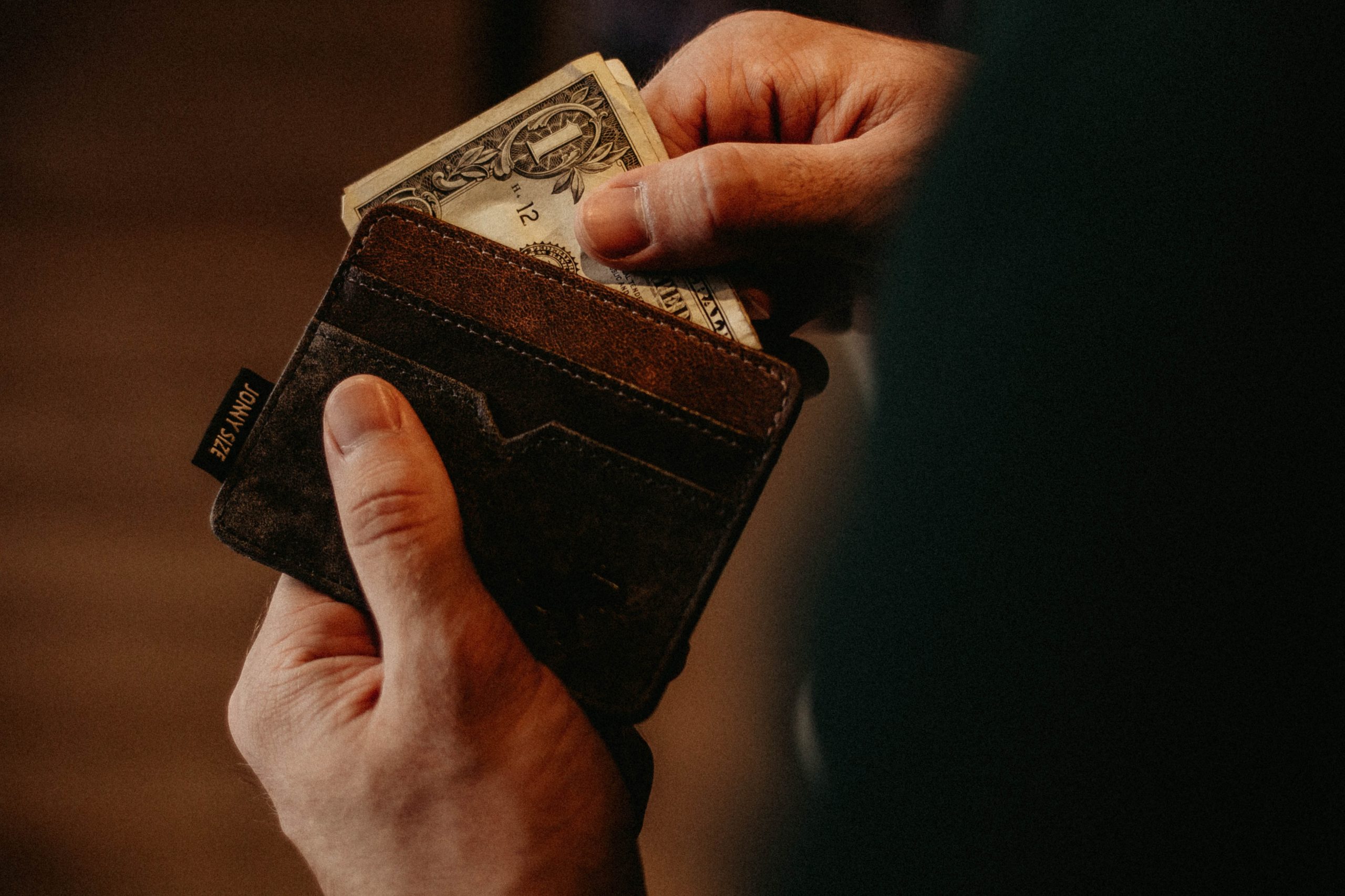 Wallet with money showing