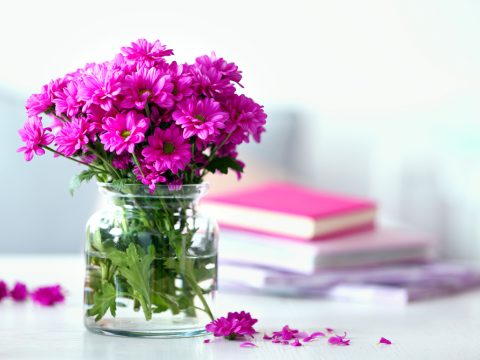Beautiful flowers in vase on table